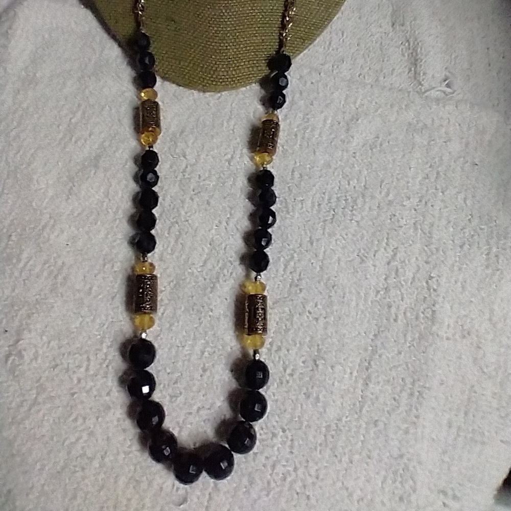 Long black beaded goldtone rope chain necklace